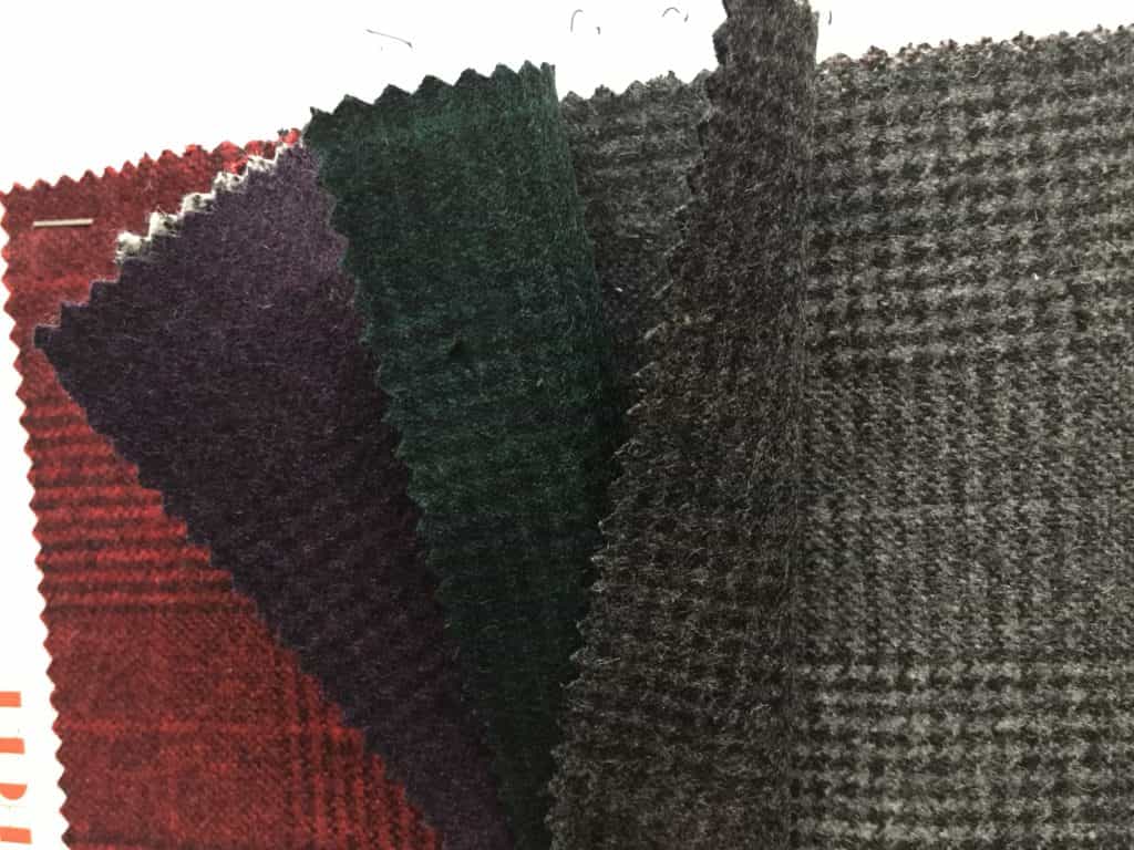 details of woolen jacket fabrics in check design