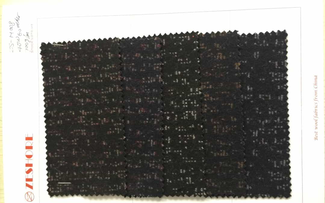 detais of woolen fabric with spots