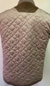detail of quilted cotton lining in men's brown jacket