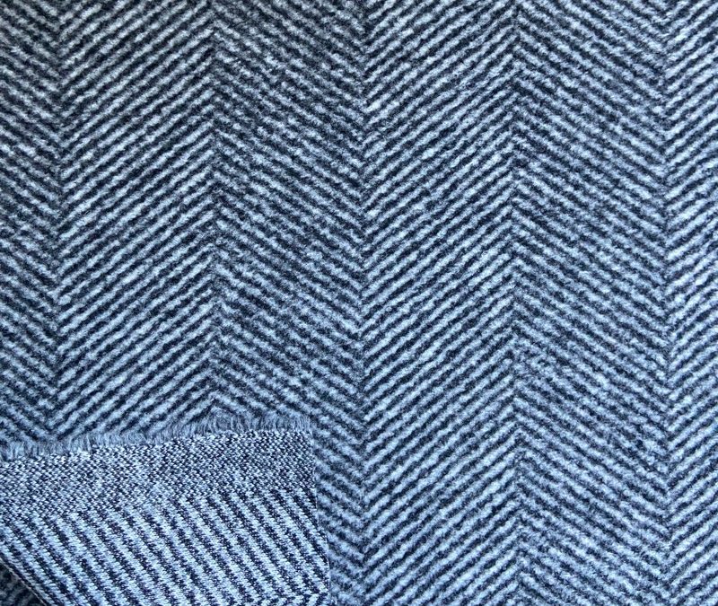 100% poly knit fabric fishbone in dark grey showing wide fishbone pattern